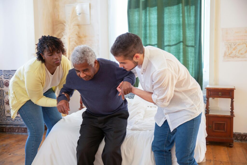 adult child checking home safety for elderly parent